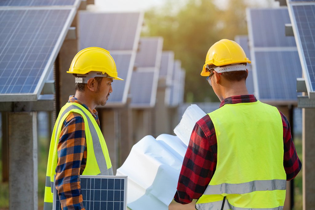 Professional engineering team working on site demonstrating teamwork and expertise